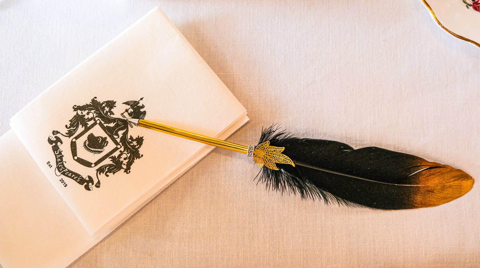 Pen with Feather on a Napkin 